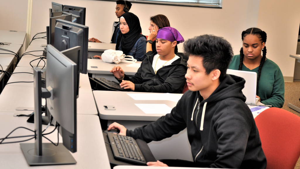 Guilford students work on desktop computers