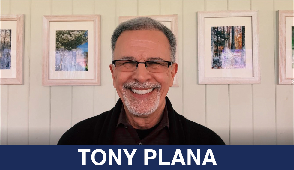 tony plana gives a big smile to the camera. the text reads "tony plana"