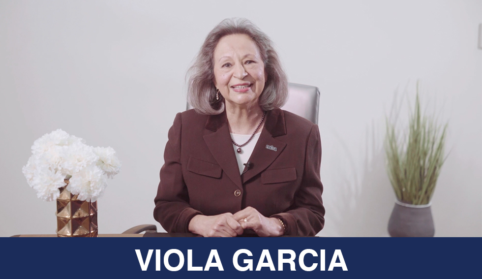 Viola Garcia smiles at the camera and the text "Viola Garcia"