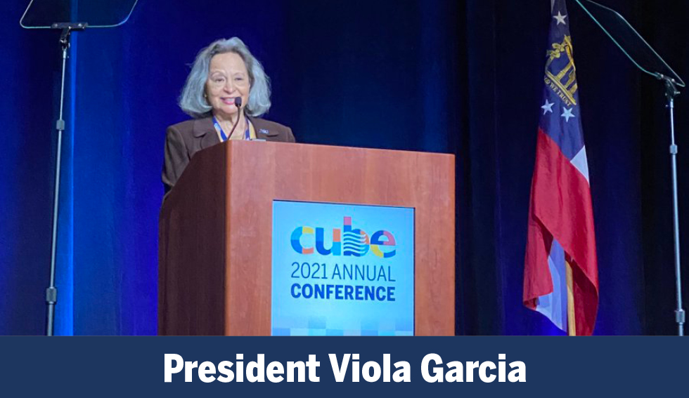 viola garcia speaks at the podium and the text "president viola garcia"
