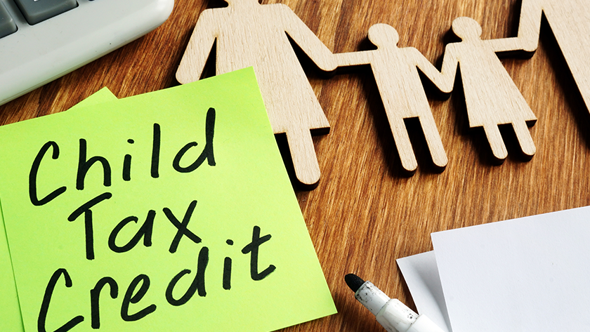 Post-it note reads 'Child Tax Credit'