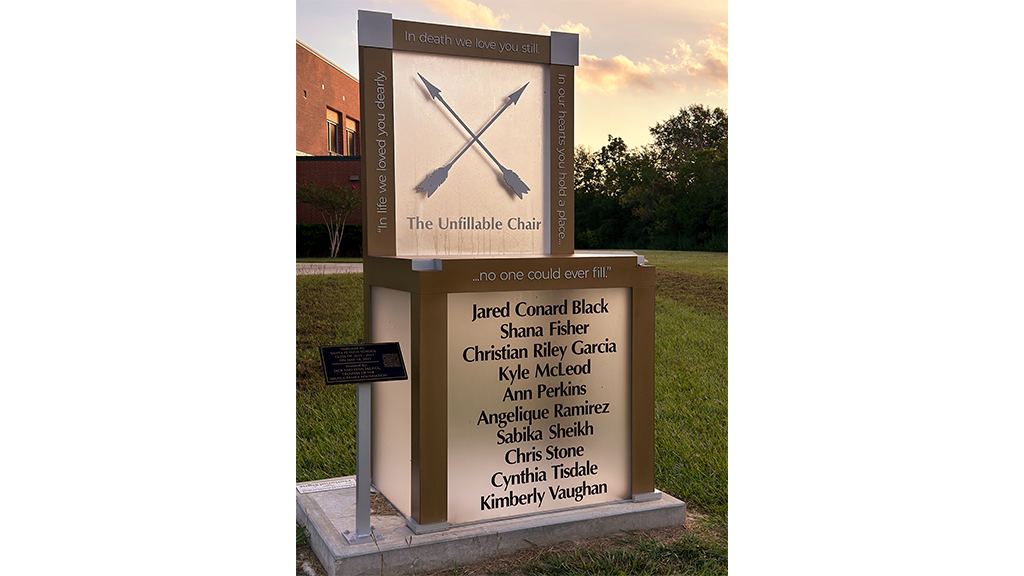 The names of the 10 victims killed in a 2018 school shooting are etched into a memorial called the "Unfillable Chair." Santa Fe, Texas.