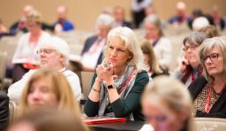 an advocacy institute attendee listens to presentations